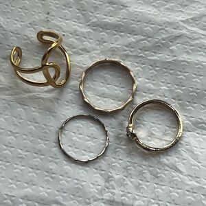 4 Gold toned stacking rings